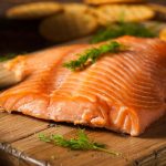 cold smoked salmon on a chopping board