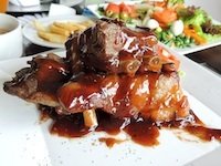 Ribs Covered in Honey BBQ Sauce