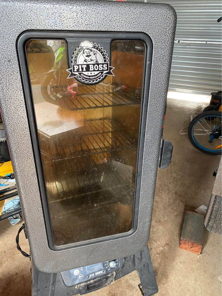 my pit boss vertical pellet smoker in the shed ready for the 4th july party