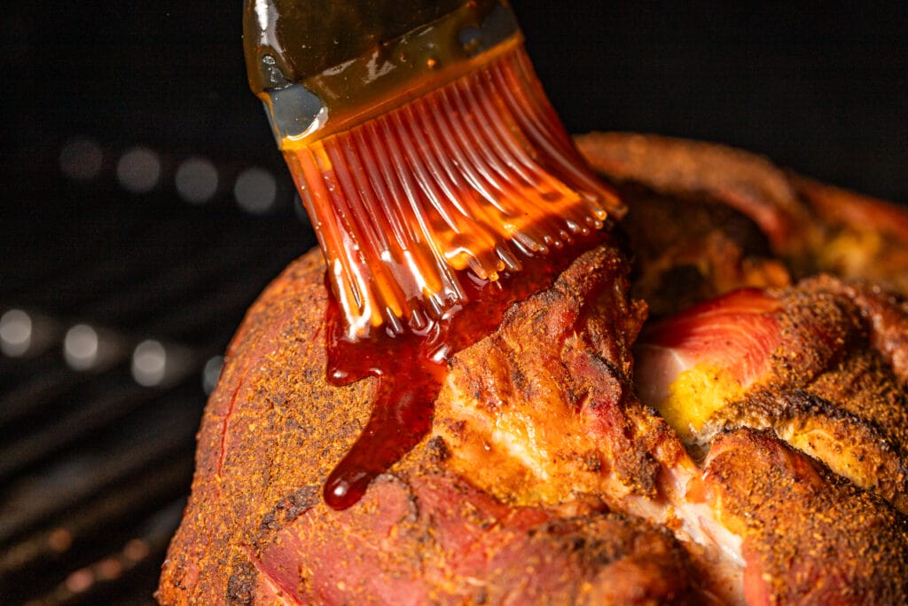 putting-glaze-on-for-pumpkin-spice-pulled-pork