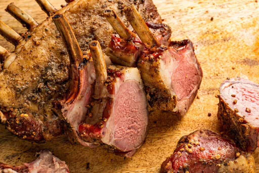 rack-of-lamb-sliced-on-chopping-board-min