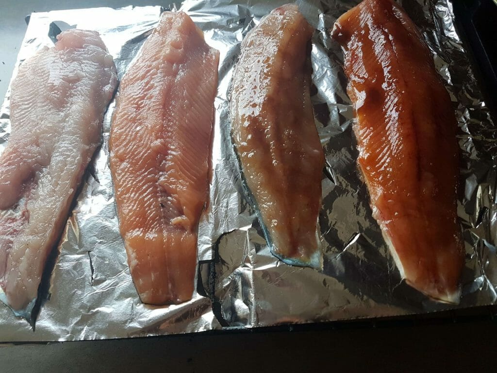 smoking tilapia on the grill on the al foil